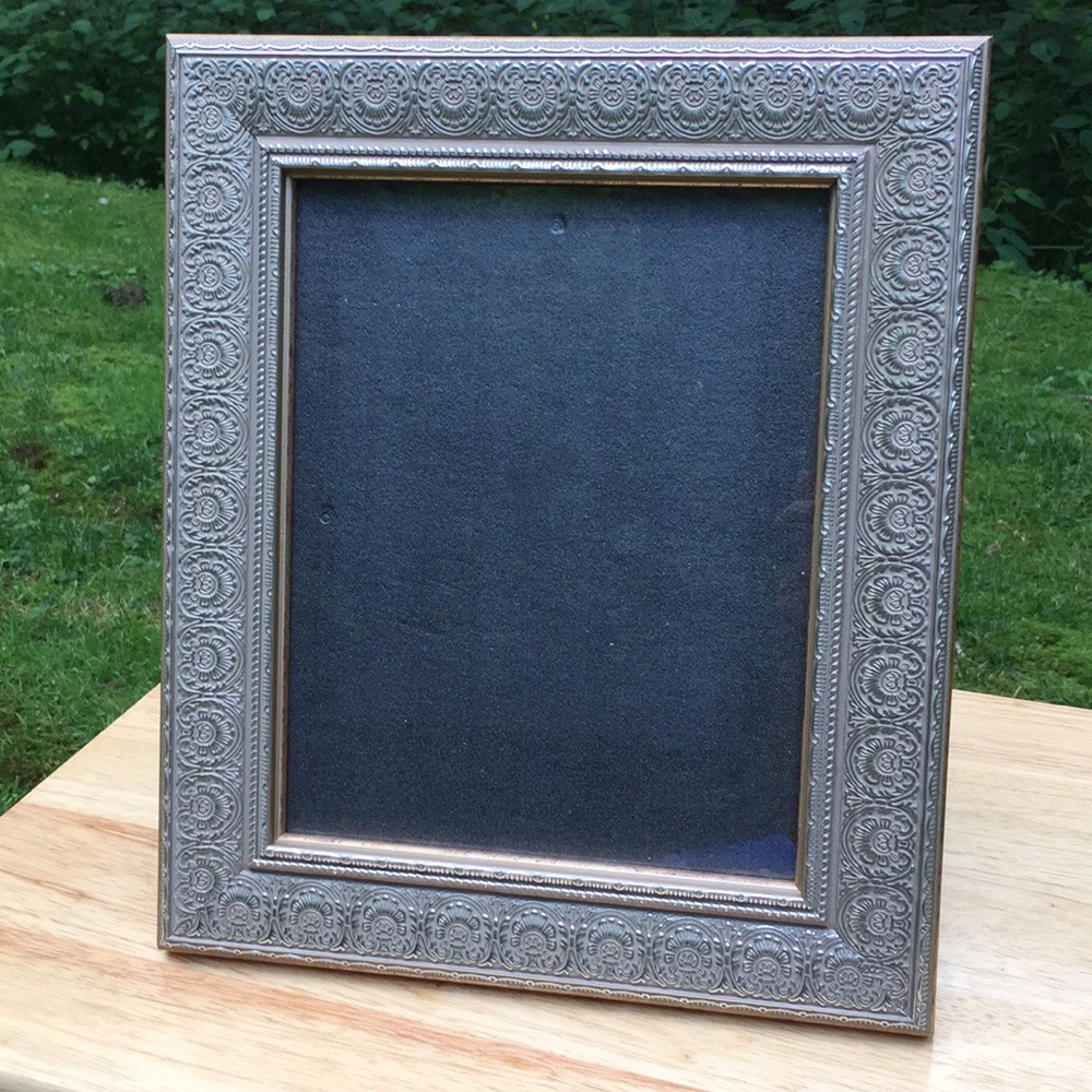 Rustic yet classy, mimicked tin picture frame.